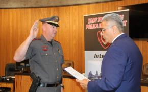 Lt. Darren Ellinwood is sworn in by Mayor Bob DaSilva