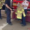 Chief Michael Carey giving out gear