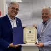 Mayor Bob DaSilva presents Dir. William Fazioli with a citation after he was awarded the Robert M. Goodrich Distinguished Public Service Award for outstanding contributions to local government.